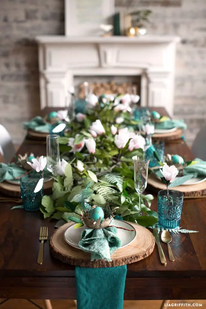 blue themed easter tablescape with easter eggs