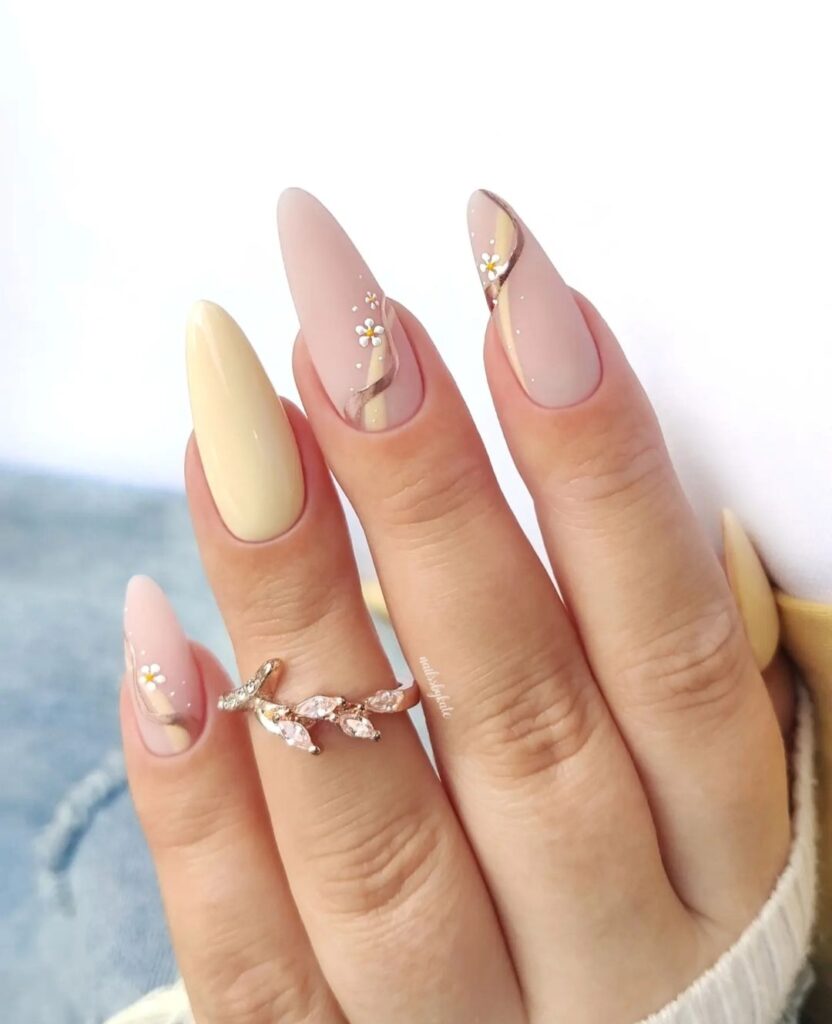 Pastel nails with mini white floral designs