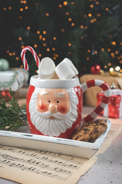 Christmas Mug with Santa Can and Marshmallows Stock Photo