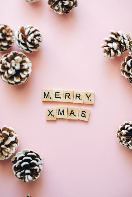 Free Merry Xmas Text On Wooden Scrabble Tiles Stock Photo