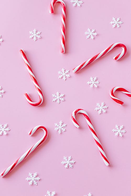 Free White and Red Candy Canes with Snowflakes Stock Photo